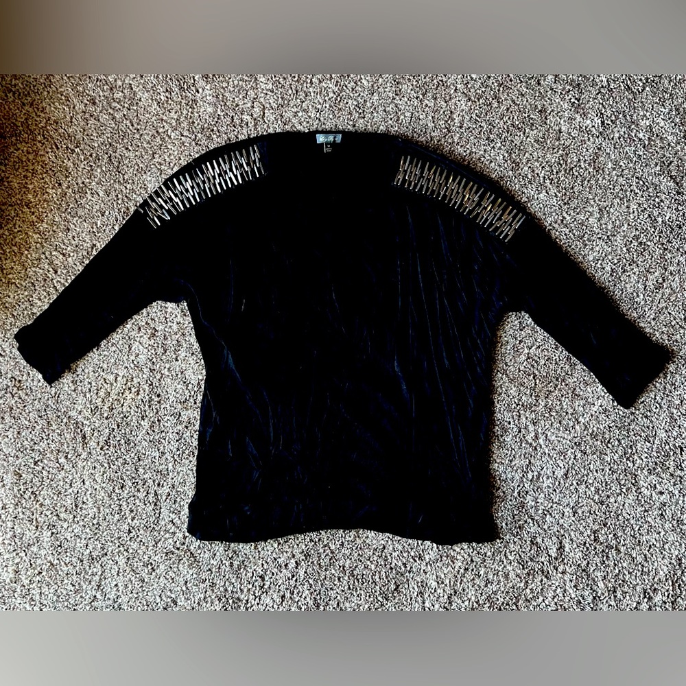 Black 3/4 sleeve shirt with faux-metal shoulder accents